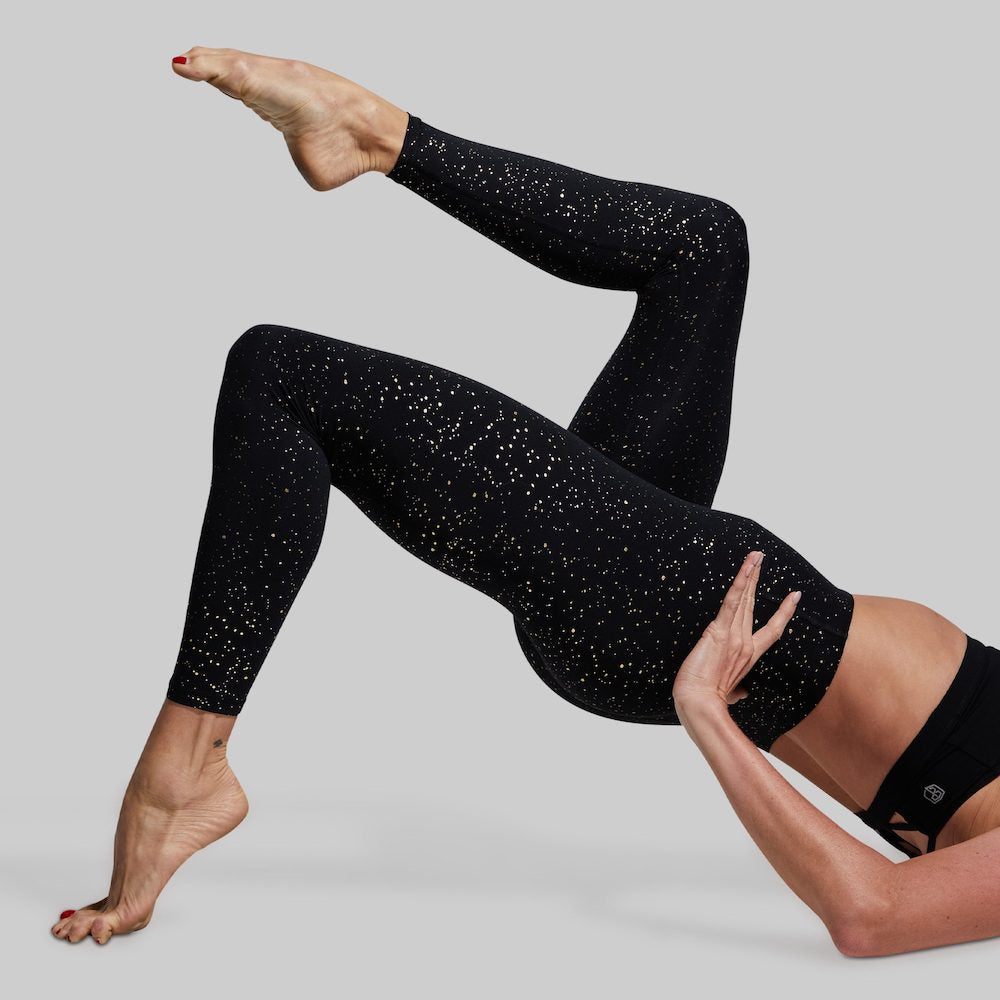 Synergy Legging (Noir) high waisted black leggings with gold metallic shimmer