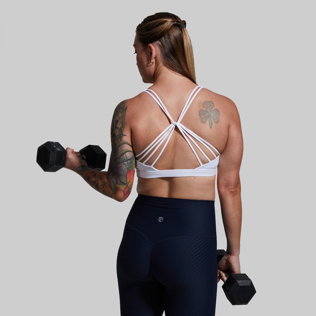 Back strappy detail with a twist dumbell bicep curl