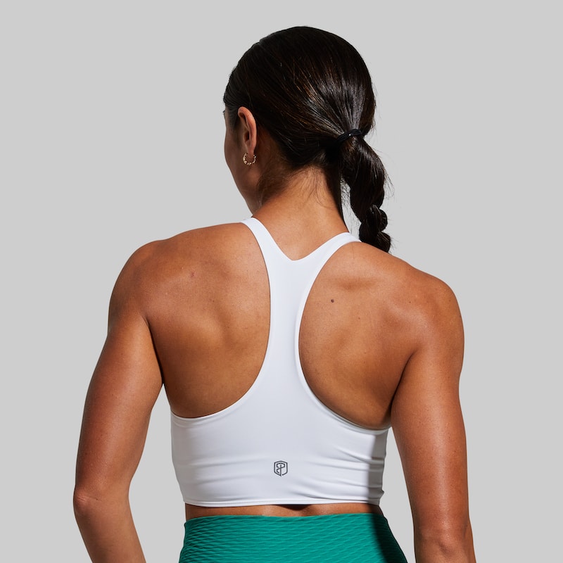 synergy cropped sports bra in white racerback design